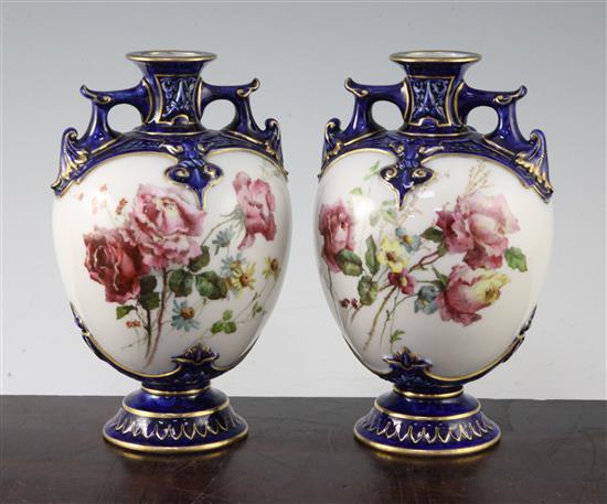 A pair of Royal Worcester ovoid two handled vases, c.1897, 19.5cm